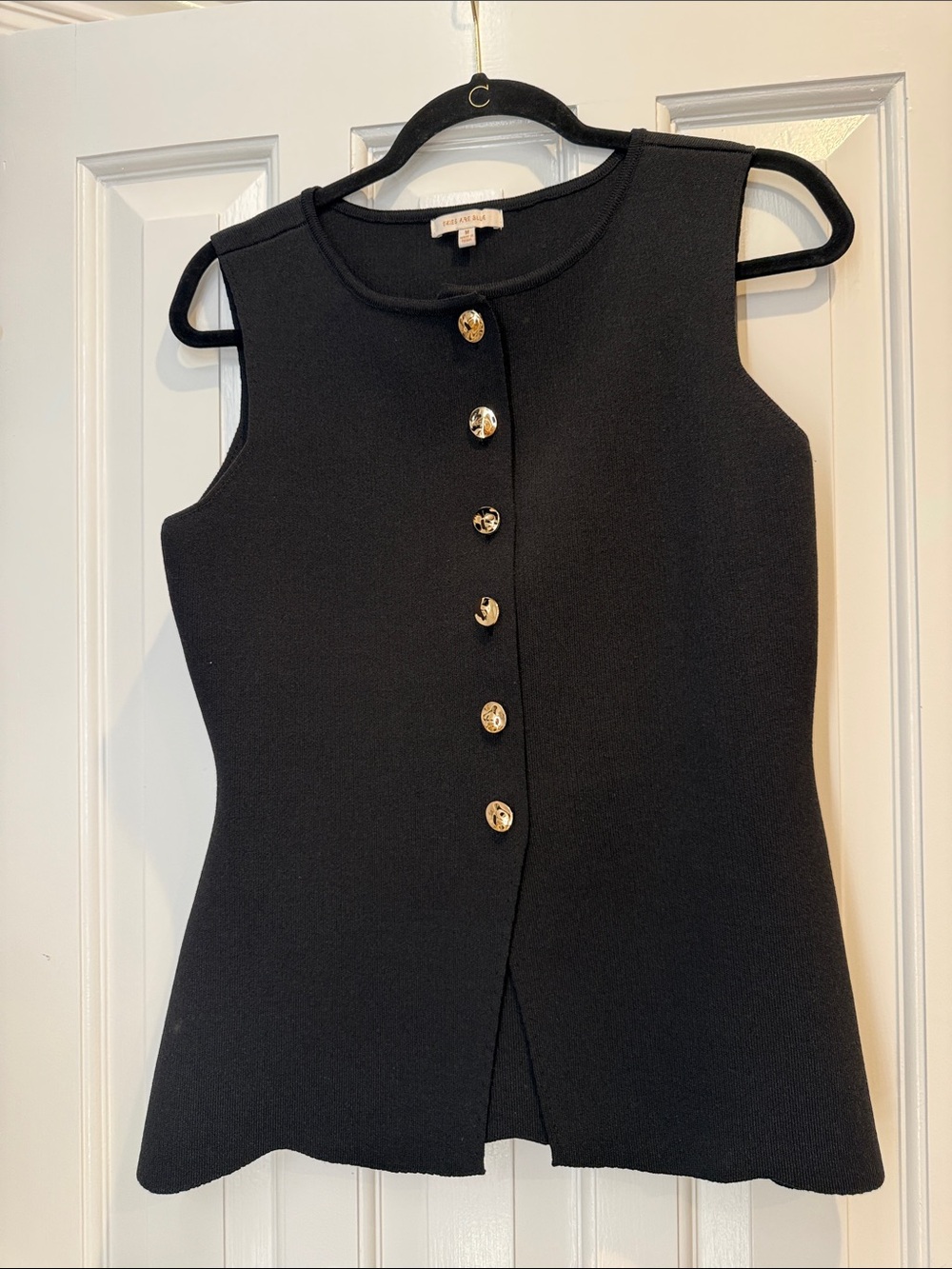 Skies are blue size medium black vest with gold buttons worn once